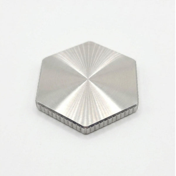 Stainless steel hexagon golf ball marker with spun face and corded edge