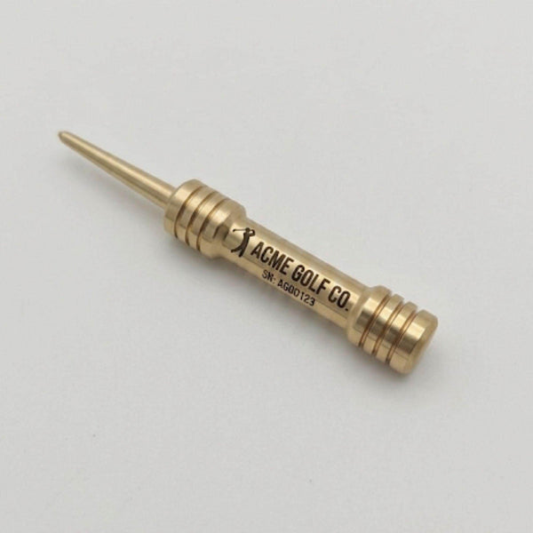 Brass barbell divot tool with a custom laser engraved golf logo and text