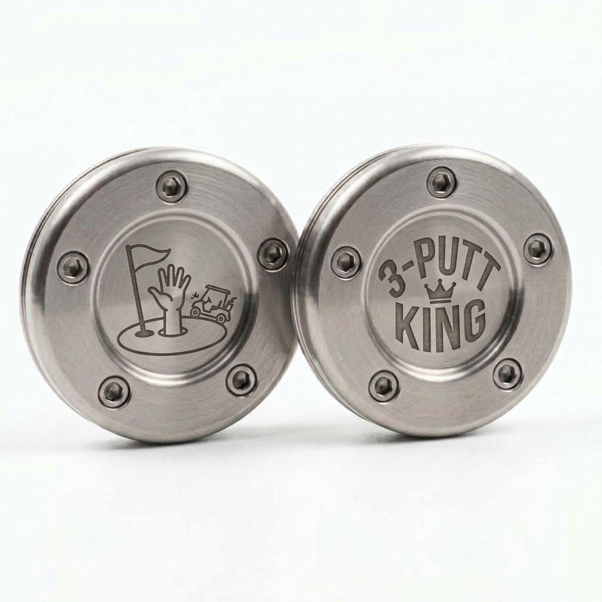 Stainless putter weights engraved with a golf hole graphic and 3-PUTT KING crown
