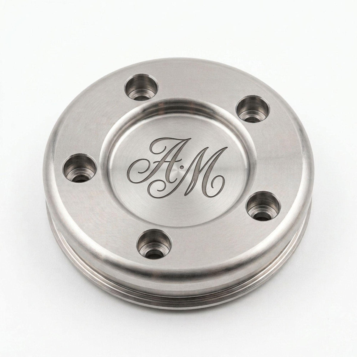 Stainless putter weight engraved with custom initials AM