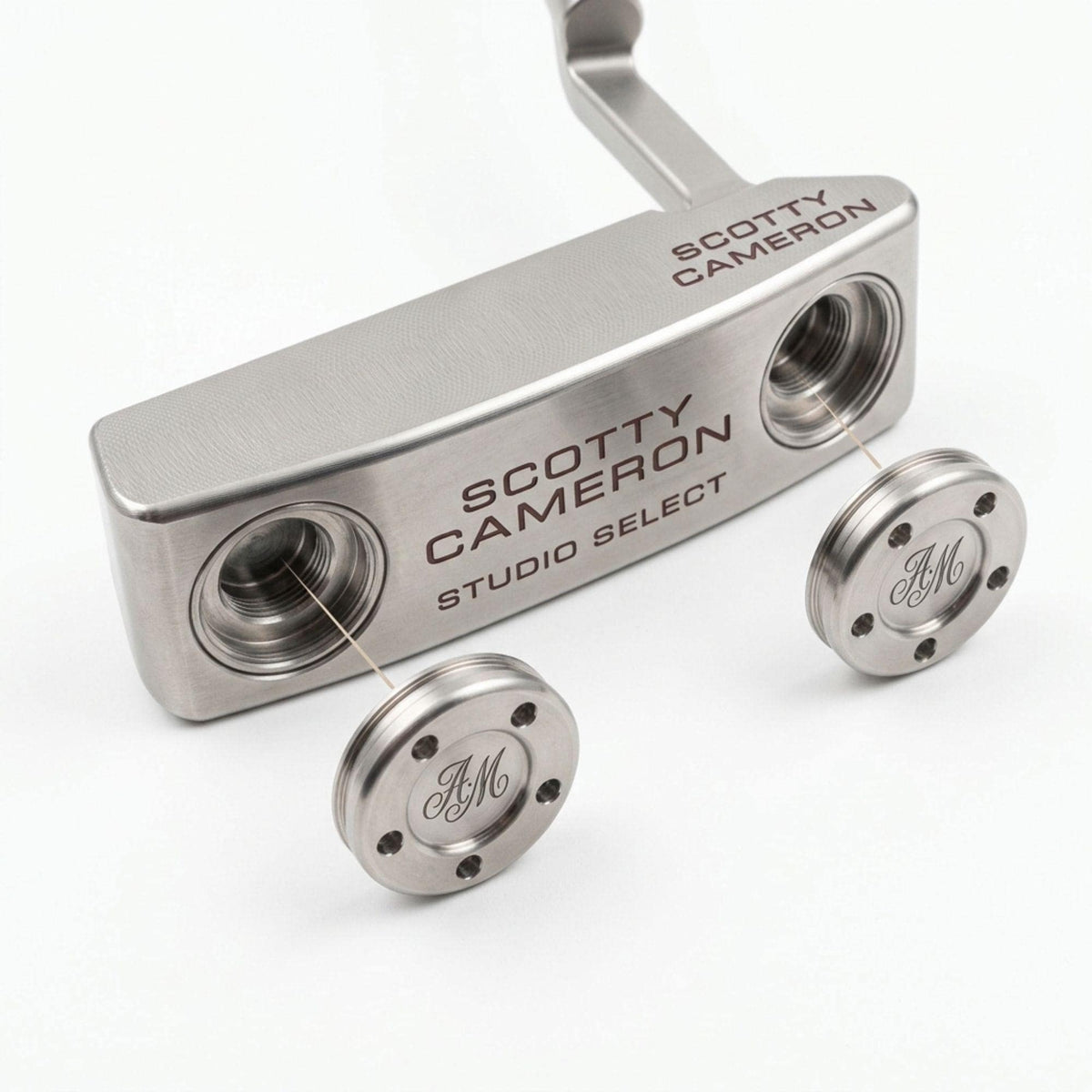 Custom initial putter weights installed in a Scotty Cameron Studio Select putter