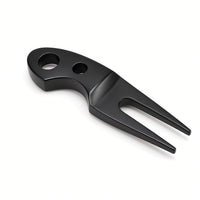 Trapper Divot Tool in black, angled view of the curved head and two prongs